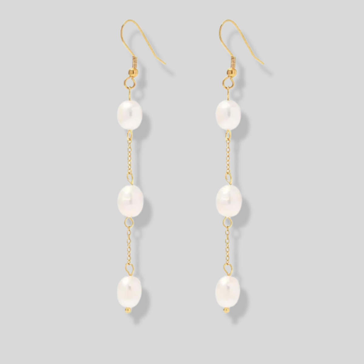 Elegantes aretes colgantes de perlas de oro de 14 quilates